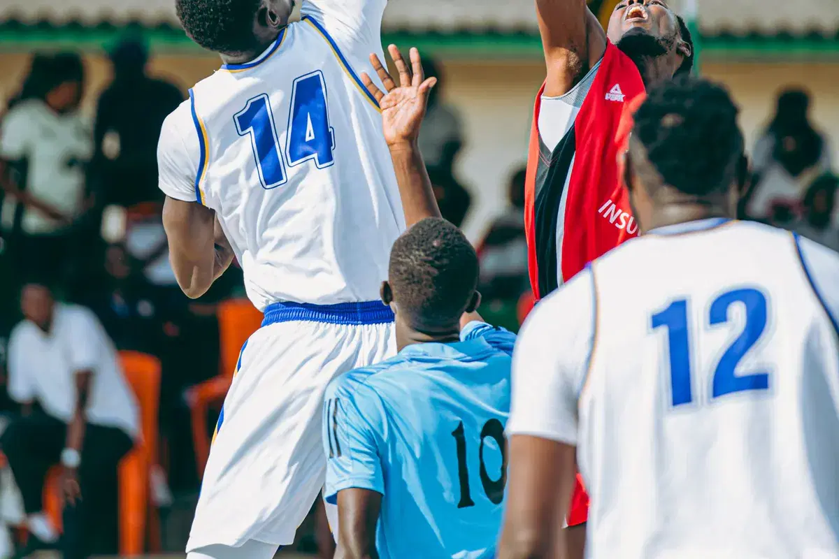 Players contesting the ball during an indoor game